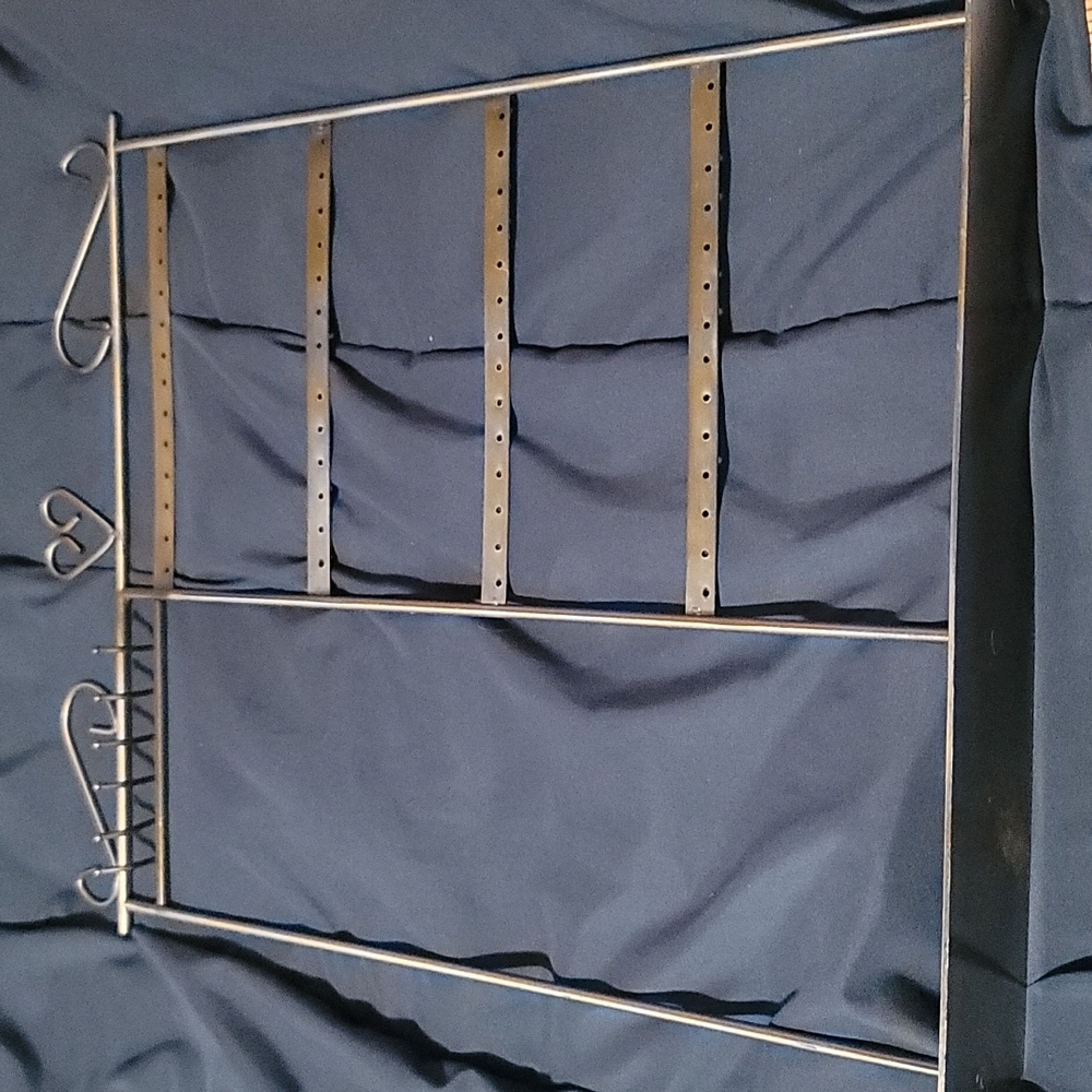 Jewelry stand for necklaces and earrings.